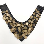 -A Heavily Embellished Neck Trim With Brass Tone Discs